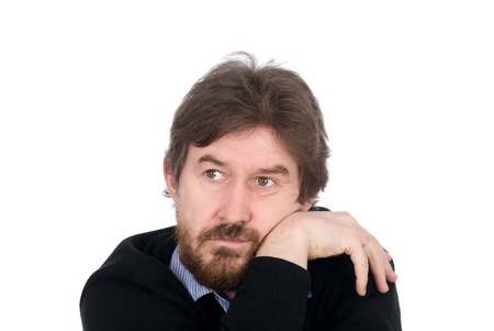 The thoughtful man looks aside. Isolated on white.