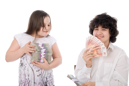 boy takes away a batch of money from girl over white backgroundの写真素材