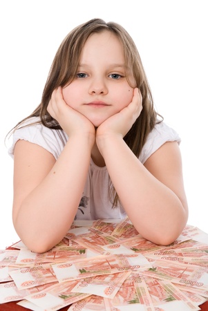 Sad child with money ruble. Isolated.の写真素材