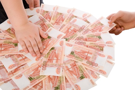 The hands holding  Russian banknotes.の写真素材
