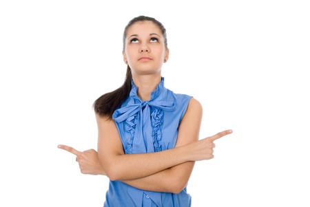 Beautiful business woman pointing with both hands over white backgroundの写真素材
