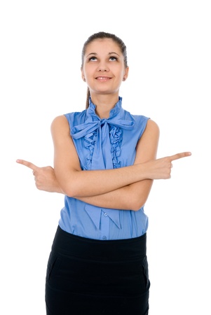 Beautiful business woman pointing with both hands over white backgroundの写真素材