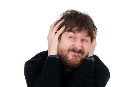 The emotional man pulls faces.Man with a beard. Isolated on a white backgroundの写真素材