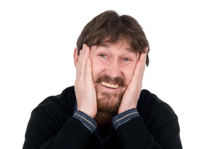 The joyful bearded man with hands on cheeks.Isolated on white backgroundの写真素材