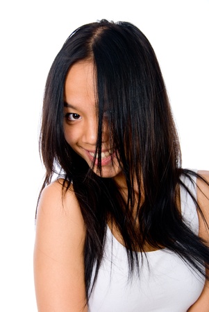 Beautiful happy portrait of an young brunette girl - isolated on whiteの写真素材