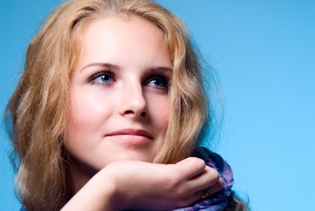 Beautiful Young Woman Face. Close-up studio portrait with copy-space.の写真素材