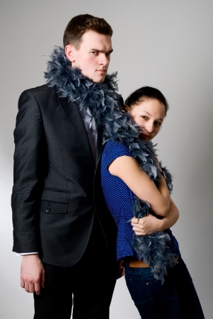 Serious young businessman and partner in a comic situationの写真素材