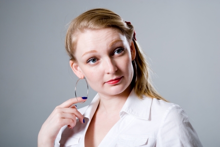 Close-up portrait of a successful business woman dreamy. The woman looks awayの写真素材