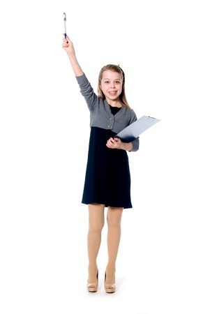 Young cheerful girl with a raised pen. Isolated on white backgroundの写真素材