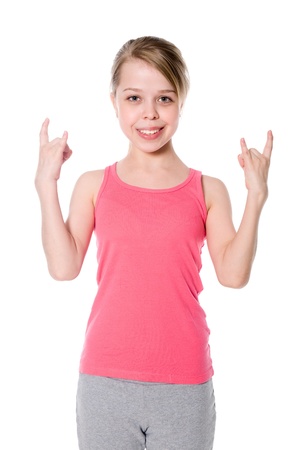 Young girl with characteristic heavy metal hand gesture.の写真素材
