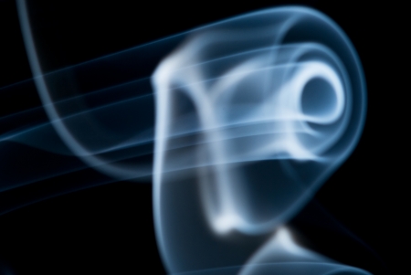 Abstract spiral shapes on a black background.の写真素材