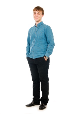 Happy smiling young man standing full length isolated on white backgroundの写真素材
