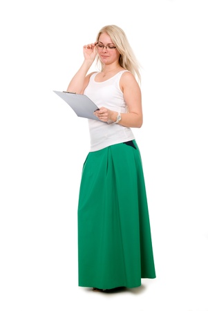 Full length of young blond holding clipboard over white backgroundの写真素材