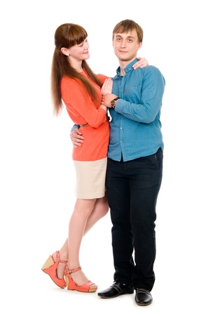 Lovers of boy and girl holding hands in full view. Isolated on white backgroundの写真素材