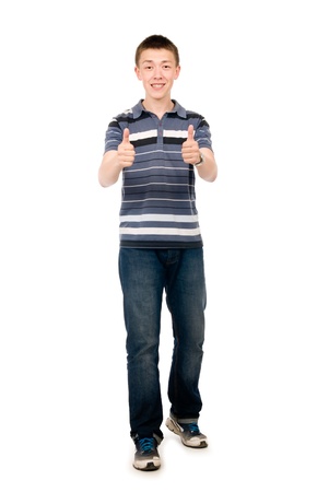Happy casual young man holds his thumbs up isolated on white backgroundの写真素材