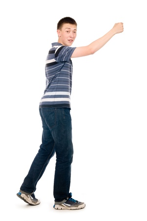 Portrait of a young man walking with his hand raised. Isolated on white backgroundの写真素材