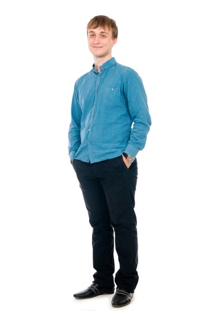 Happy smiling young man standing full length isolated on white backgroundの写真素材