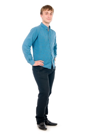 Happy smiling young man standing full length isolated on white backgroundの写真素材