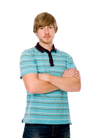 Portrait of a handsome young man staring against isolated white backgroundの写真素材