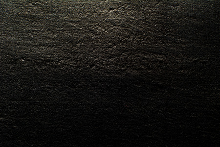 Black canvas illuminated from and vintage grunge textureの写真素材