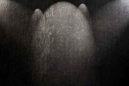 Black canvas illuminated from and vintage grunge の写真素材