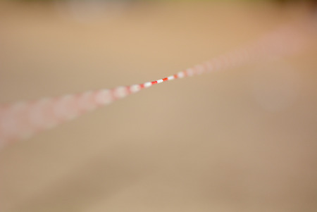 Stop the tape with red and white stripes. Warning of dangerの写真素材