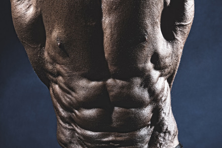 Close-up of abdominal muscles bodybuilder.の写真素材