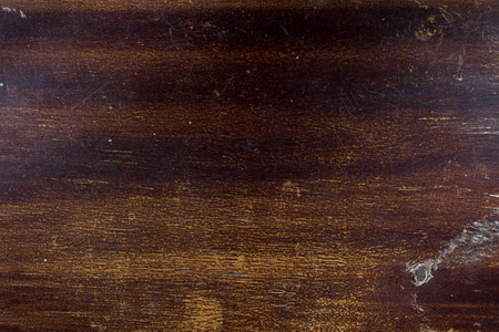 Old wood texture lacquered and scratched.の写真素材
