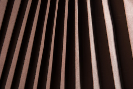 Background of brown old rough fabric of the old wooden camera.の写真素材