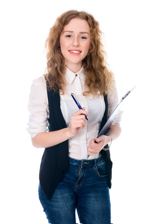 Cheerful business woman with pen and tablet for notes. Isolated on a white の写真素材