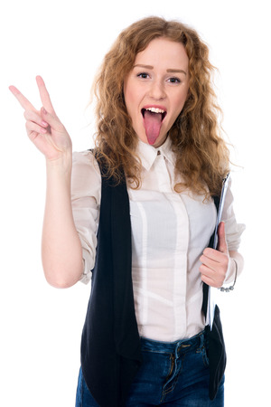 Business woman showing victory sign and his long tongue. Isolated on a white の写真素材