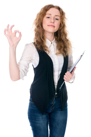 Business woman making a OK gesture. Isolated on white の写真素材
