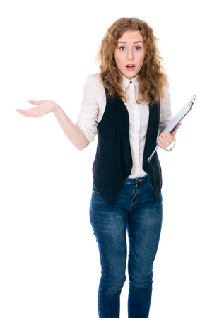 Surprised business woman with an open hand to the side. Isolated on a white の写真素材