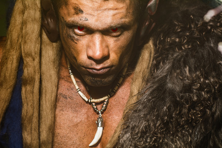 Close-up portrait of a strong man with a skin on skin.の写真素材