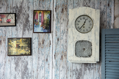 Draw a picture and clock on the old wall. Background of the old wooden boardsの写真素材