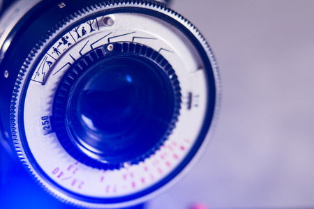 Close-up lens Photo Film camera with a purple light. Drawn men on the lens barrelの写真素材