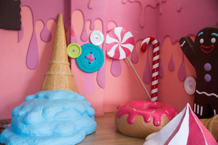 Confectionery style, colorful fake big sweets. Background for a children's holiday and funの写真素材