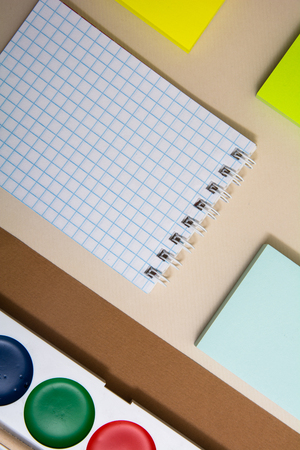 Notepad sticky paper for snakes and watercolor paints. Blocks of paper for recording on a delimited surfaceの写真素材