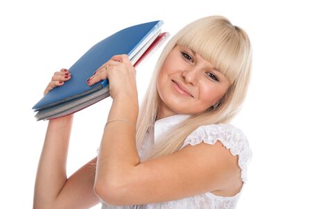 Close up of a cheerful young woman with business folders. Secretary isolated over white backgroundの写真素材