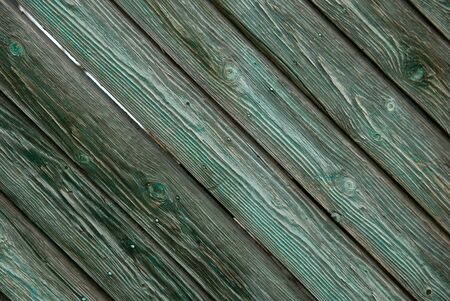 Background of old painted wooden planks laid out diagonally. Advertising spaceの写真素材