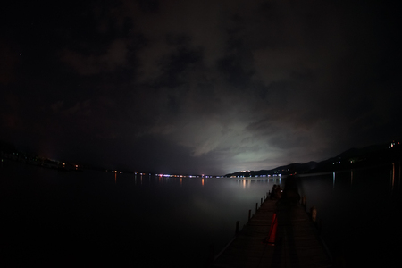 Lake Yamanaka and the starry skyの写真素材