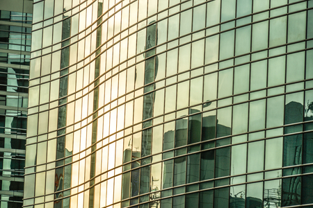 Evening of light reflected to the buildingの写真素材