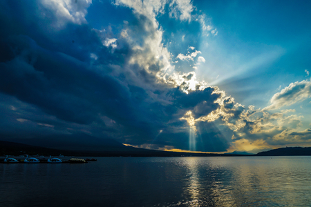 Light of the sun is plugged Lake Yamanakaの写真素材