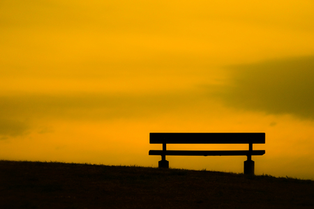 Bench of the dusk of the hill