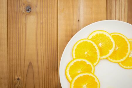 Orange of the image that has been placed in the dishの写真素材