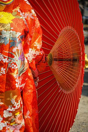 Red twelve-layered ceremonial kimono (Japanese national costume)の写真素材