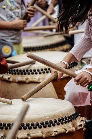 Images of children that hit the taiko