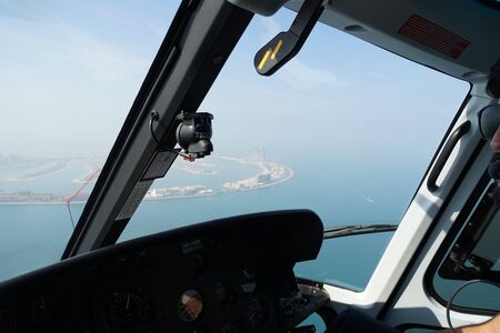 Dubais urban landscape as seen from helicopter
