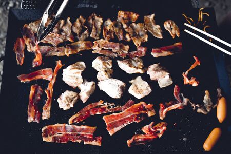 Charcoal-grilled meat image at barbecue