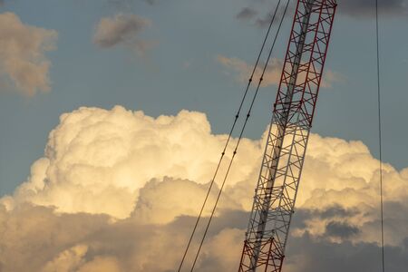 Large cranes and summer thunderheadの写真素材
